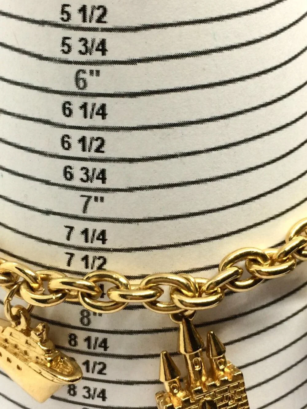 VINTAGE AVON BRACELET Rich & Famous Gold Tone 5 Charm Travel Theme 1980s - Picture 11 of 12